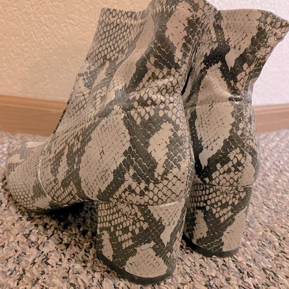 Snakeskin heeled boots